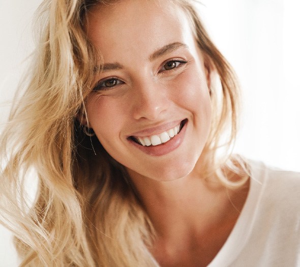 Closeup of woman with blonde hair smiling