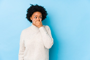 person with gum disease covering mouth